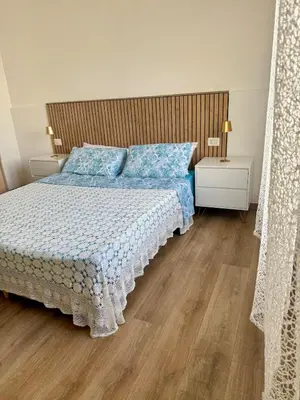 Letto o letti in una camera di Casa Rosmarino