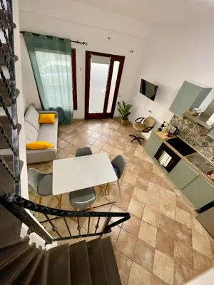 Area soggiorno di Casa IXI