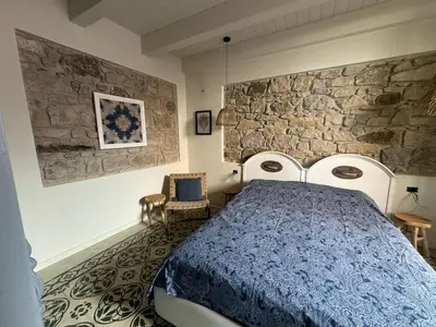 Letto o letti in una camera di Tuna house