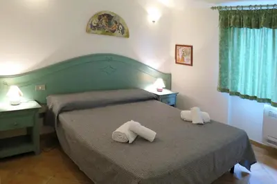 Letto o letti in una camera di Villa on Costa Rei near Sandy Beach