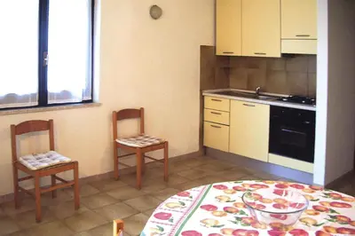 Cucina o angolo cottura di Apartment on Costa Rei near White Beaches