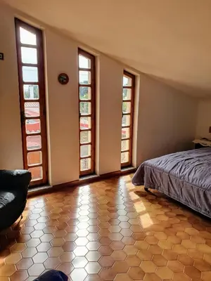 Letto o letti in una camera di Villa Margherita