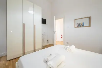 Letto o letti in una camera di Le Scale sul Porto