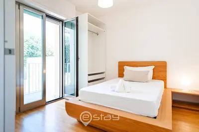 Letto o letti in una camera di Villa Margine Rosso