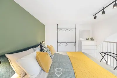 Letto o letti in una camera di 24 Via Giardini