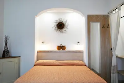Letto o letti in una camera di Domu Speciosa