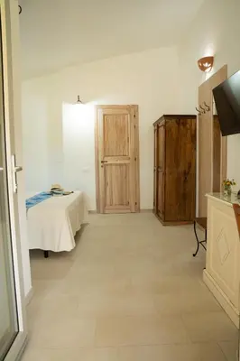 Letto o letti in una camera di Domu Speciosa