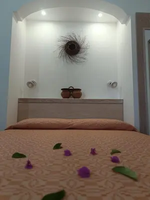 Letto o letti in una camera di Domu Speciosa