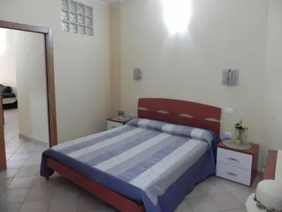 Letto o letti in una camera di Buggerru a Mare Residence