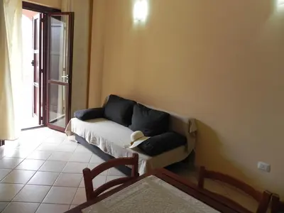 Area soggiorno di Buggerru a Mare Residence