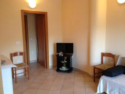 Area soggiorno di Buggerru a Mare Residence