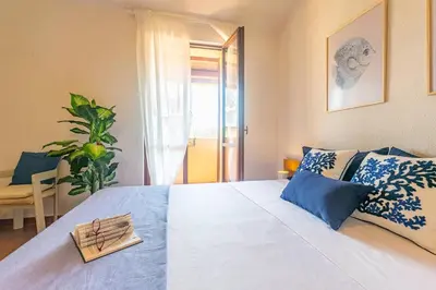 Letto o letti in una camera di Casa Pighetti