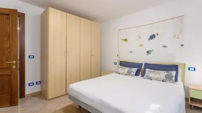 Letto o letti in una camera di Casa Gio