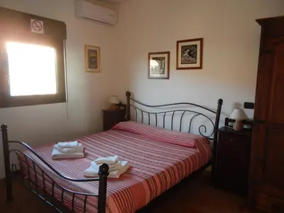 Letto o letti in una camera di Domu de Jana