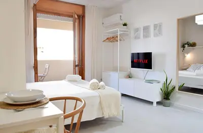 Letto o letti in una camera di Poetto Studio, Private Parking, SmartTV, Park View