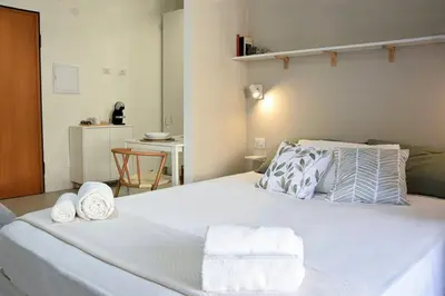 Letto o letti in una camera di Poetto Studio, Private Parking, SmartTV, Park View