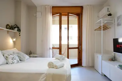 Letto o letti in una camera di Poetto Studio, Private Parking, SmartTV, Park View
