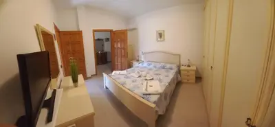 Letto o letti in una camera di Molentargius Domus