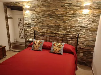 Letto o letti in una camera di Stampace House