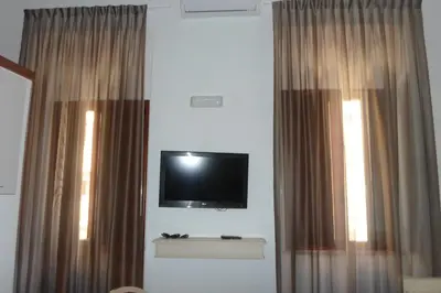 TV o dispositivi per l'intrattenimento presso Affittacamere Louis