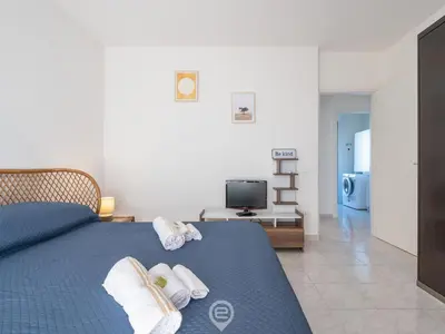 Letto o letti in una camera di Sunset Oasis Apartment