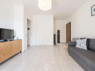 TV o dispositivi per l'intrattenimento presso Sunset Oasis Apartment