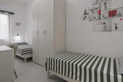 Letto o letti in una camera di Affittacamere La Violica