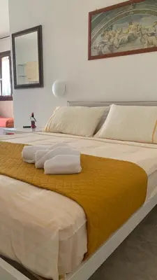 Letto o letti in una camera di CASA VACANZE gli ULIVI 23