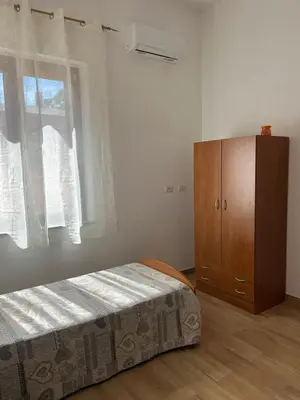 Letto o letti in una camera di Casa Vacanze Is Bangius