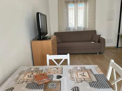 TV o dispositivi per l'intrattenimento presso Casa Vacanze Is Bangius