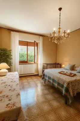 Letto o letti in una camera di Tina's House