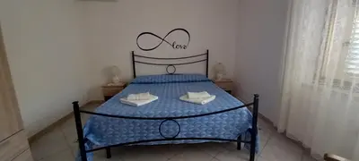 Letto o letti in una camera di Il Giardino