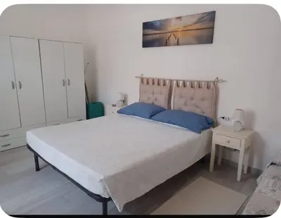 Letto o letti in una camera di Casa Claudia