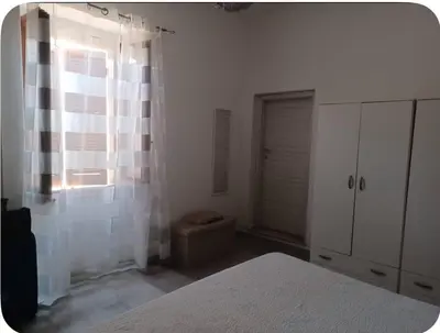 Letto o letti in una camera di Casa Claudia
