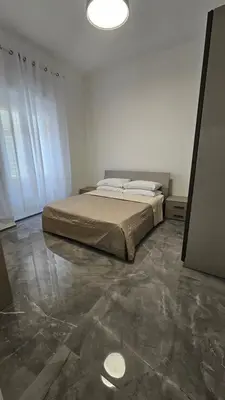 Letto o letti in una camera di Appartamenti Ospedale brotzu
