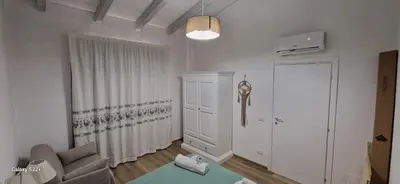 Letto o letti in una camera di Imperyal case vacanze Sud Sardegna