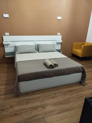 Letto o letti in una camera di L'Anima del viaggio