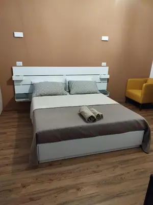 Letto o letti in una camera di L'Anima del viaggio