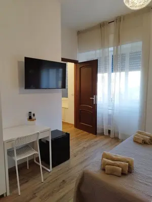 Letto o letti in una camera di L'Anima del viaggio