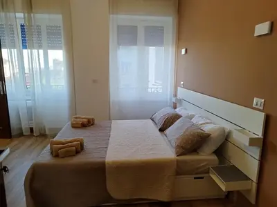 Letto o letti in una camera di L'Anima del viaggio