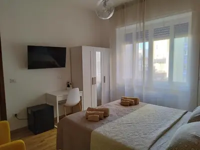 Letto o letti in una camera di L'Anima del viaggio