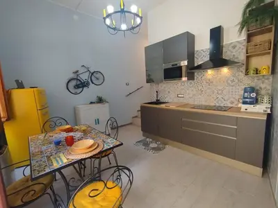 Cucina o angolo cottura di Casa Vacanze - Domus Nettuno