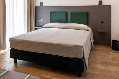 Letto o letti in una camera di Terre del Mandrolisai