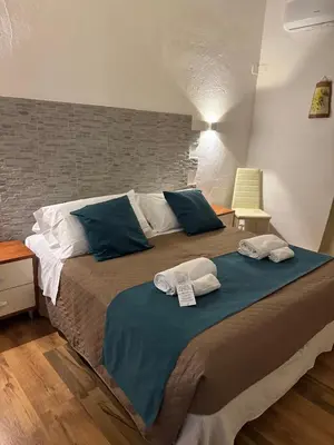 Letto o letti in una camera di La Mimosa