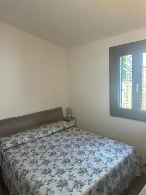 Letto o letti in una camera di Villa Dea