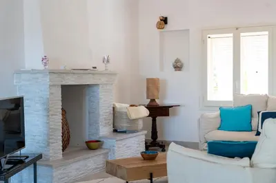 Area soggiorno di Villa Bianca con accesso diretto alla spiaggia