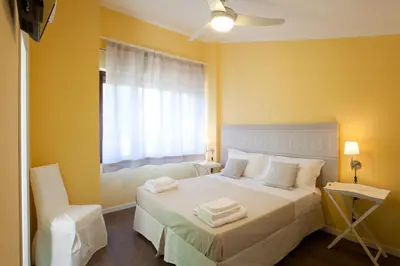 Letto o letti in una camera di La Tuia e il Tasso