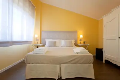 Letto o letti in una camera di La Tuia e il Tasso