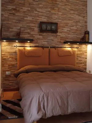 Letto o letti in una camera di Villa Lobe