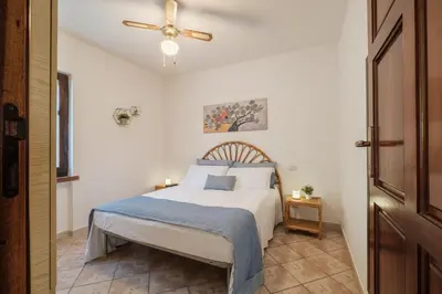 Letto o letti in una camera di Beach Family Villa Torre delle Stelle